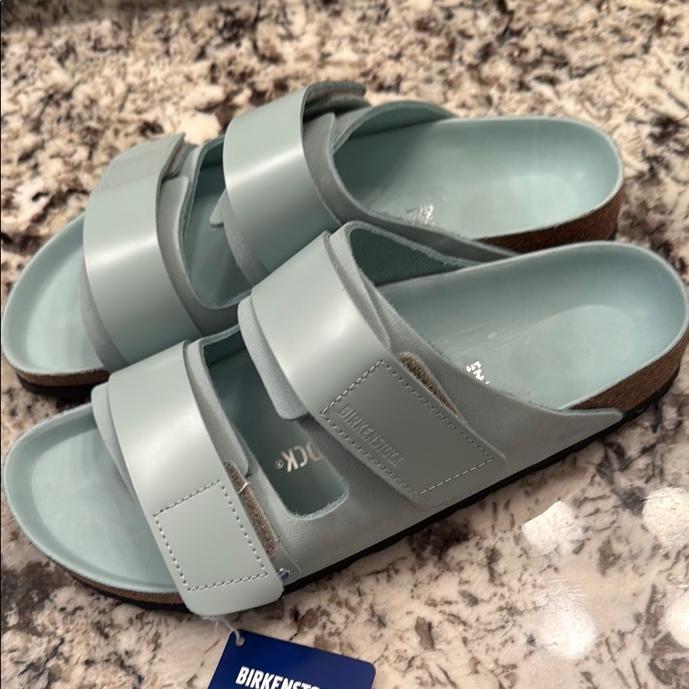 Birkenstock Aqua Slide Sandals..leather ..size ladies 
11 or 42 EUR
